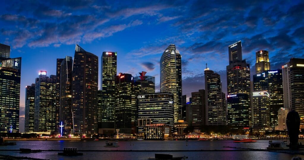 Night view of Singapore’s Marina Bay financial district, home to Venturewave’s Asia-Pacific headquarters