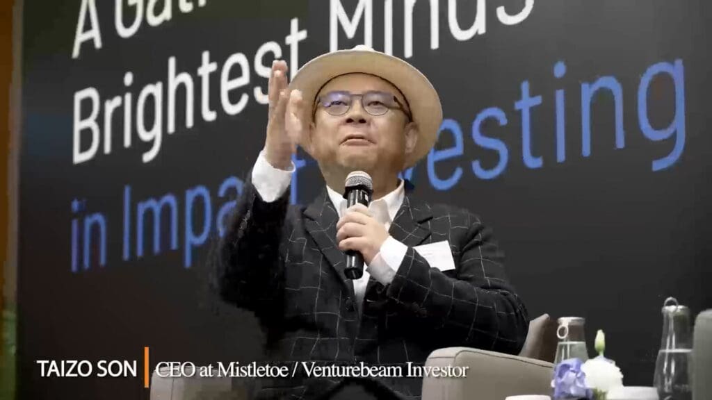 Venturewave More Than Capital 2025 – Taizo Son speaking on impact investing and partnership at the Venturewave event.