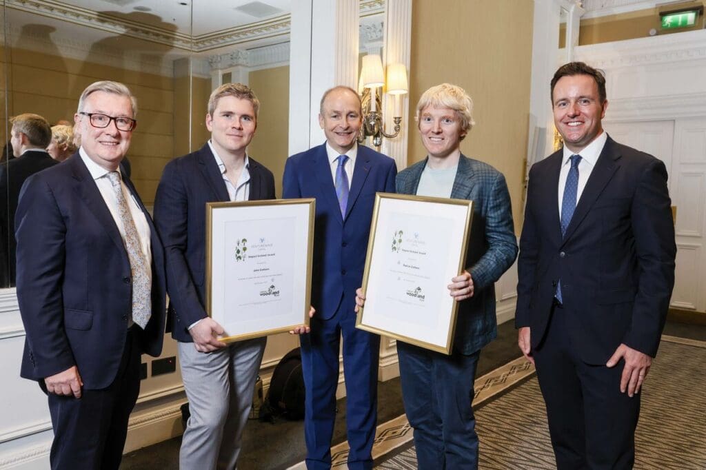 Kieran McLoughlin, John Collison, An Taoiseach Micheál Martin, Patrick Collison and Alan Foy at The Shelbourne with the Impact Ireland Award certificates.