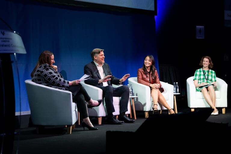 Panel discussion at Impact Ireland 2025 on energy, growth and security, with four speakers on stage in conversation